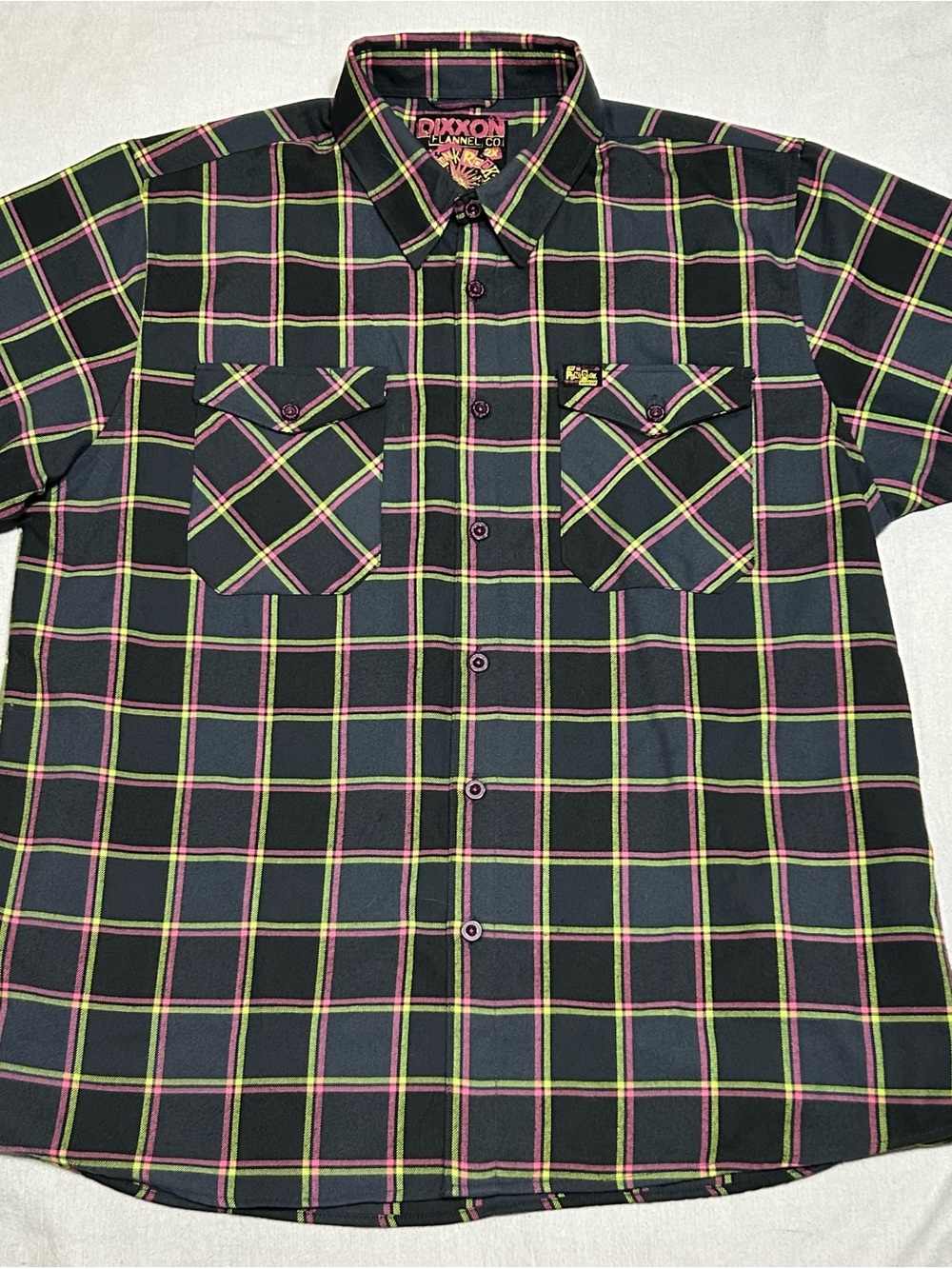 DIXXON Black Plaid Short-Sleeve Button-Up with Neon Pink & Lime Accents